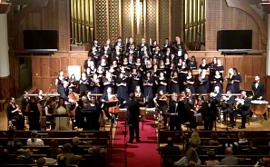 Photograph of Bram leading the UMKC University Singers in Handel's Judas Maccabaeus, November 2015.